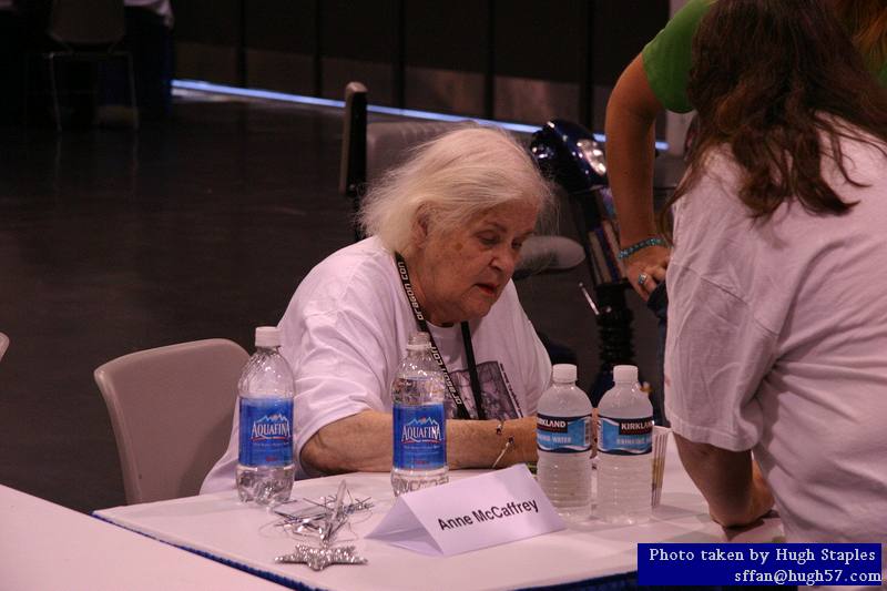 Anne McCaffrey signs autographs