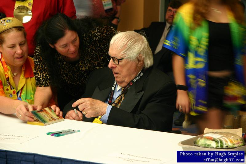 Ray Bradbury signs autographs