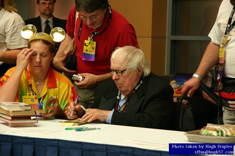 Ray Bradbury signs autographs