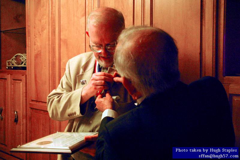 RAH Award winner is presented his award medal and plaque<br />by David Silver, President of the Heinlein Society