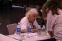 Anne McCaffrey signs autographs