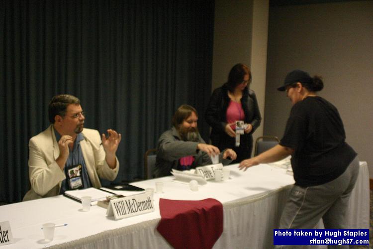 Will McDermott, Dave Freer and Lois Gresh prepare to discuss "Writers with No Lives"