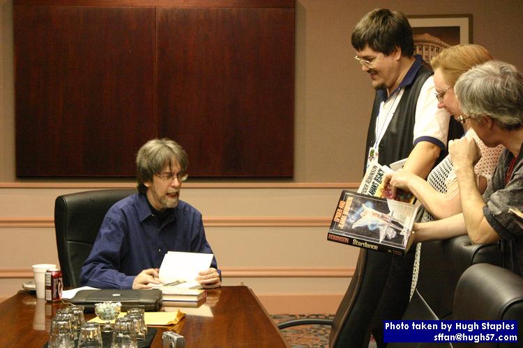 Spider Robinson signs books after reading from "Very Bad Deaths," (his latest) and from<br />the forthcoming "Varible Star" (collaboration with Robert A. Heinlein)