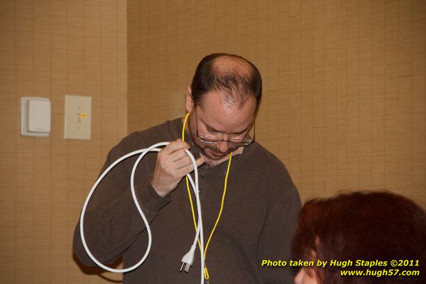 Context 24, with GOHs John Scalzi (subbing for L.E. Modesitt), Seanan McGuire and more!Panel: "More Than Just Window Dressing: How Secondary Characters Make Your Novel Come Alive" Panelist John Scalzi charges his phone and/or laptop prior to panel