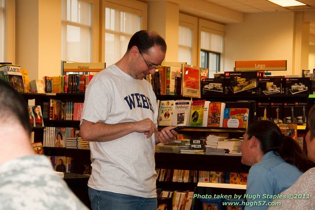 John Scalzi signs Fuzzy NationTweeting, no doubt.