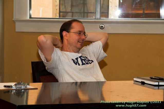 John Scalzi signs Fuzzy NationAs the crowd sings Happy Birthday.