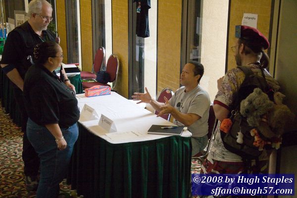 Millenicon 22 �  GOH Steven Barnes autographs his books