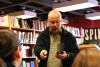 Rob Sawyer performs a passage from his new novel, MINDSCAN, before a small, but loyal and attentive crowd of about 15 people.