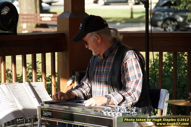 Tex Schramm & The Radio King Cowboys, a country band, perform on a downright chilly (for August), but otherwise beautiful night at Greenhills Concert on the Commons