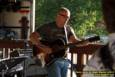 Tex Schramm & The Radio King Cowboys, a country band, perform on a downright chilly (for August), but otherwise beautiful night at Greenhills Concert on the Commons