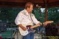 Tex Schramm & The Radio King Cowboys, a country band, perform on a downright chilly (for August), but otherwise beautiful night at Greenhills Concert on the Commons