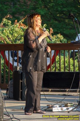 Pam Yenser performs on a beautiful July night at Greenhills Concert on the Commons during break.