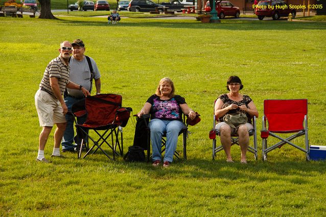 A soggy and stormy evening, but the show must go on with Ricky Nye & The Red Hots at Greenhills Summer Concerts on the Commons