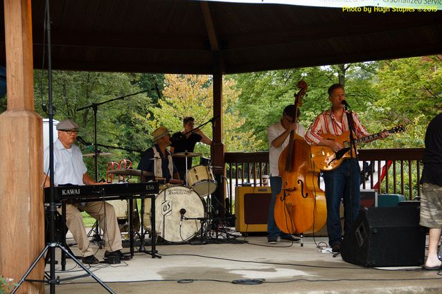 A soggy and stormy evening, but the show must go on with Ricky Nye & The Red Hots at Greenhills Summer Concerts on the Commons