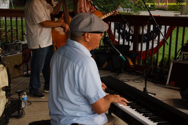 A soggy and stormy evening, but the show must go on with Ricky Nye & The Red Hots at Greenhills Summer Concerts on the Commons