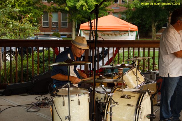 A soggy and stormy evening, but the show must go on with Ricky Nye & The Red Hots at Greenhills Summer Concerts on the Commons