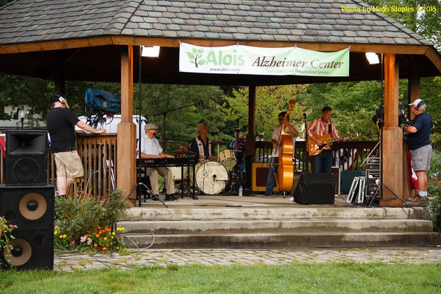 A soggy and stormy evening, but the show must go on with Ricky Nye & The Red Hots at Greenhills Summer Concerts on the Commons