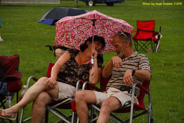 A soggy and stormy evening, but the show must go on with Ricky Nye & The Red Hots at Greenhills Summer Concerts on the Commons