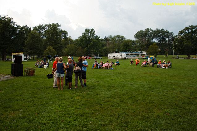 A soggy and stormy evening, but the show must go on with Ricky Nye & The Red Hots at Greenhills Summer Concerts on the Commons