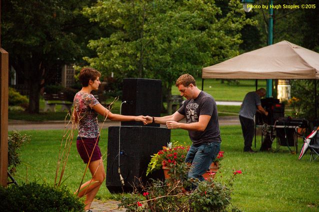 A soggy and stormy evening, but the show must go on with Ricky Nye & The Red Hots at Greenhills Summer Concerts on the Commons