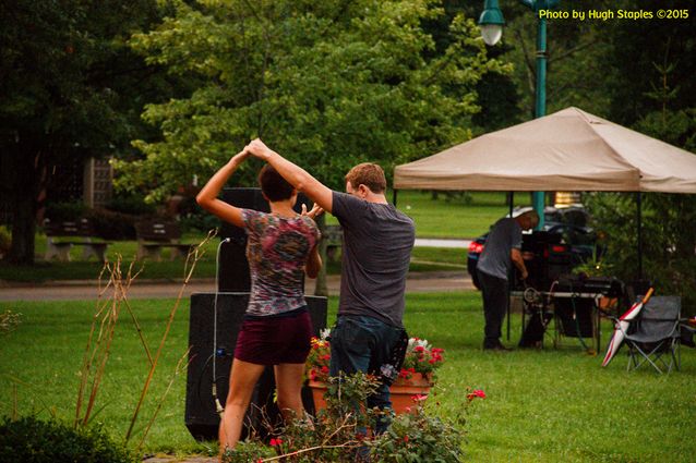 A soggy and stormy evening, but the show must go on with Ricky Nye & The Red Hots at Greenhills Summer Concerts on the Commons