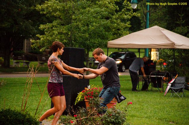 A soggy and stormy evening, but the show must go on with Ricky Nye & The Red Hots at Greenhills Summer Concerts on the Commons