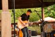 A soggy and stormy evening, but the show must go on with Ricky Nye & The Red Hots at Greenhills Summer Concerts on the Commons