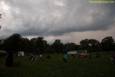 A soggy and stormy evening, but the show must go on with Ricky Nye & The Red Hots at Greenhills Summer Concerts on the Commons
