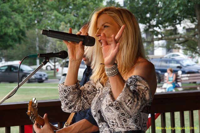 Storms threaten, but hold off long enough for the Amy Sailor Band to give a very energetic performance at Greenhills Summer Concerts on the Commons