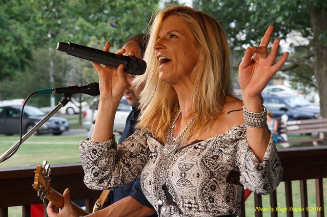 Storms threaten, but hold off long enough for the Amy Sailor Band to give a very energetic performance at Greenhills Summer Concerts on the Commons