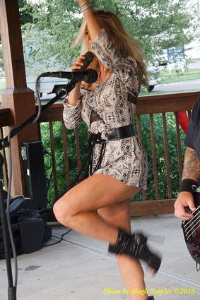 Storms threaten, but hold off long enough for the Amy Sailor Band to give a very energetic performance at Greenhills Summer Concerts on the Commons