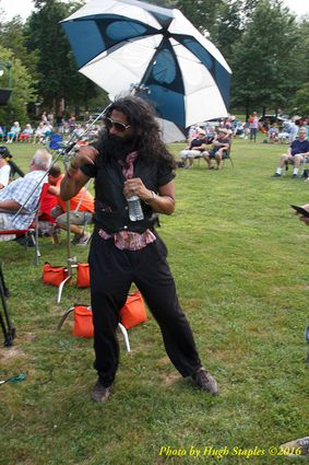 Storms threaten, but hold off long enough for the Amy Sailor Band to give a very energetic performance at Greenhills Summer Concerts on the Commons