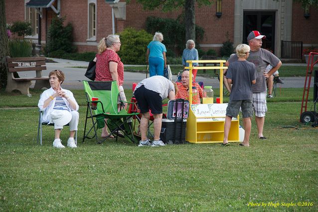 Storms threaten, but hold off long enough for the Amy Sailor Band to give a very energetic performance at Greenhills Summer Concerts on the Commons