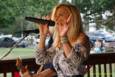 Storms threaten, but hold off long enough for the Amy Sailor Band to give a very energetic performance at Greenhills Summer Concerts on the Commons
