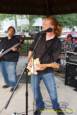 Storms threaten, but hold off long enough for the Amy Sailor Band to give a very energetic performance at Greenhills Summer Concerts on the Commons