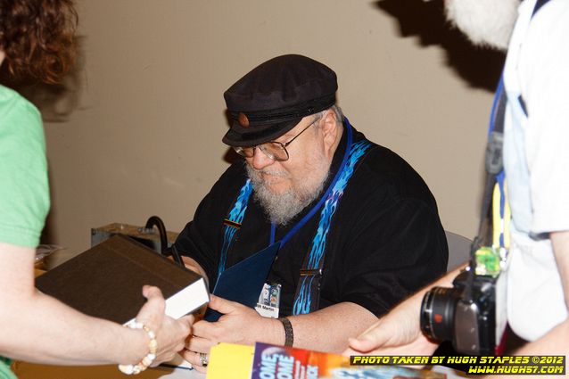 Game of Thrones author George R.R. Martin signs books for his fans