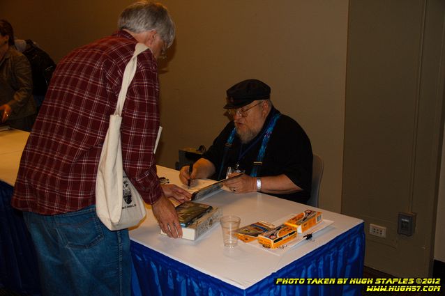 Game of Thrones author George R.R. Martin signs books for his fans