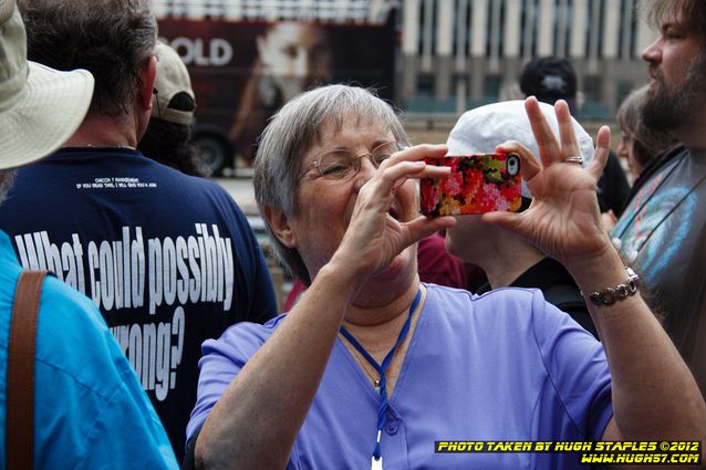 Strolling with the Stars, including Joe and Gay Haldeman, Story Musgrave, and John Scalzi. Here, Gay Haldeman snaps a photo.