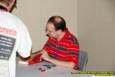John Scalzi signs books for his fans.